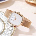 montre HANNAH MARTIN rose gold cadran géométrique fond blanc